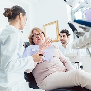 a dentist showing a patient their digital impression