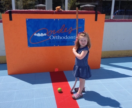 Smiling child at community event