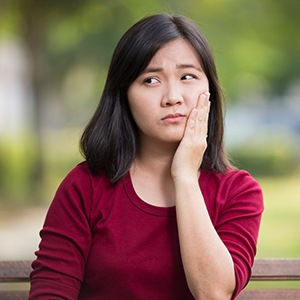 Woman experiencing dental pain