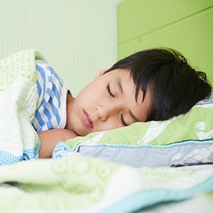 young child sleeping comfortably 