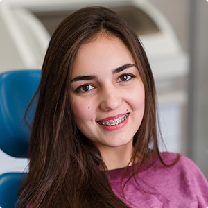 Teen with traditional braces