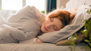 young woman sleeping soundly