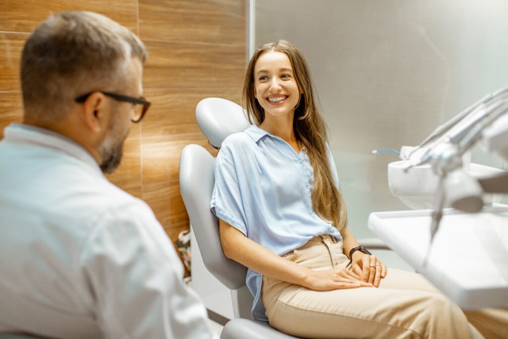 Lady consults with dentist